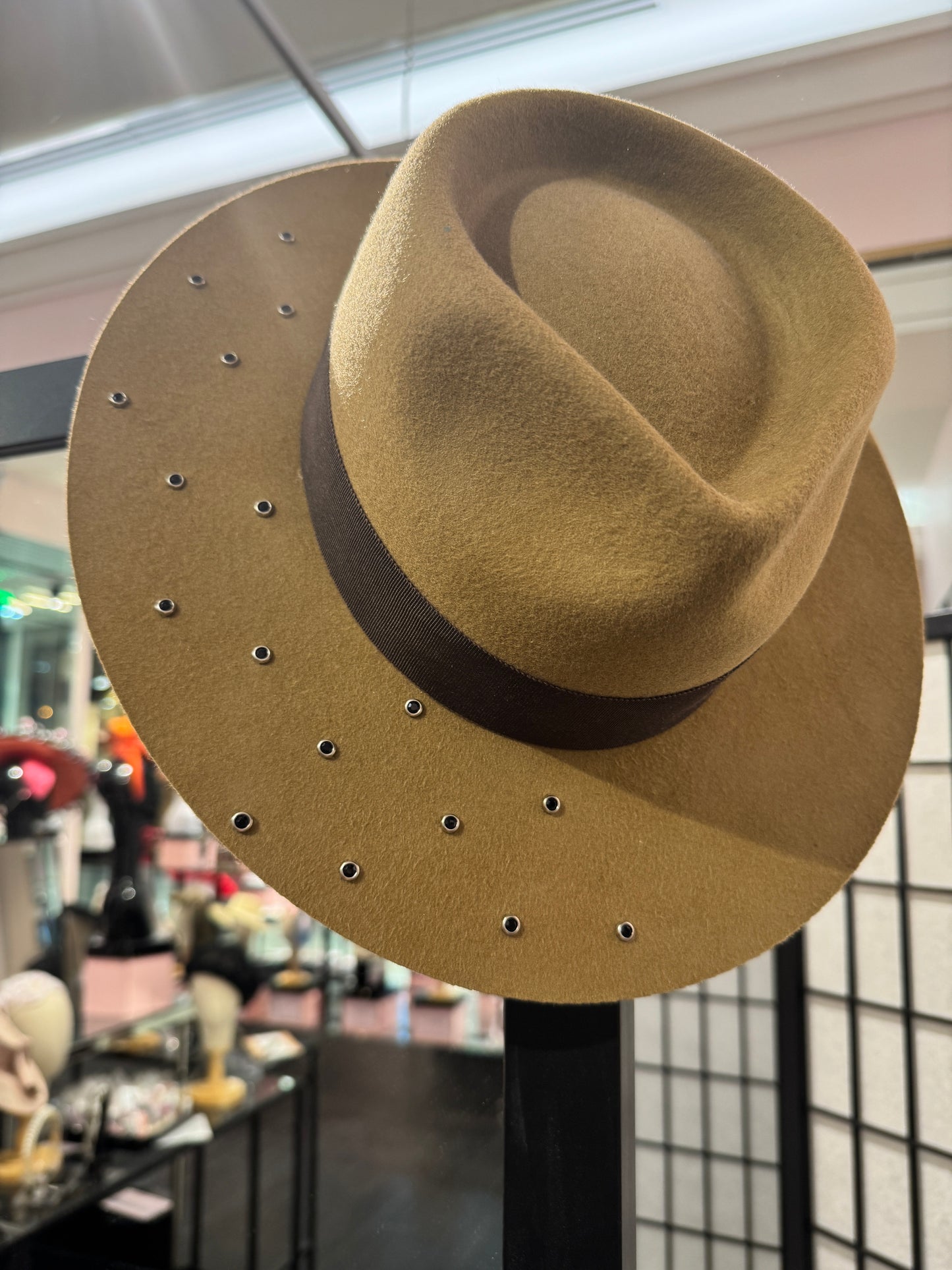 Mid brown fedora hat.