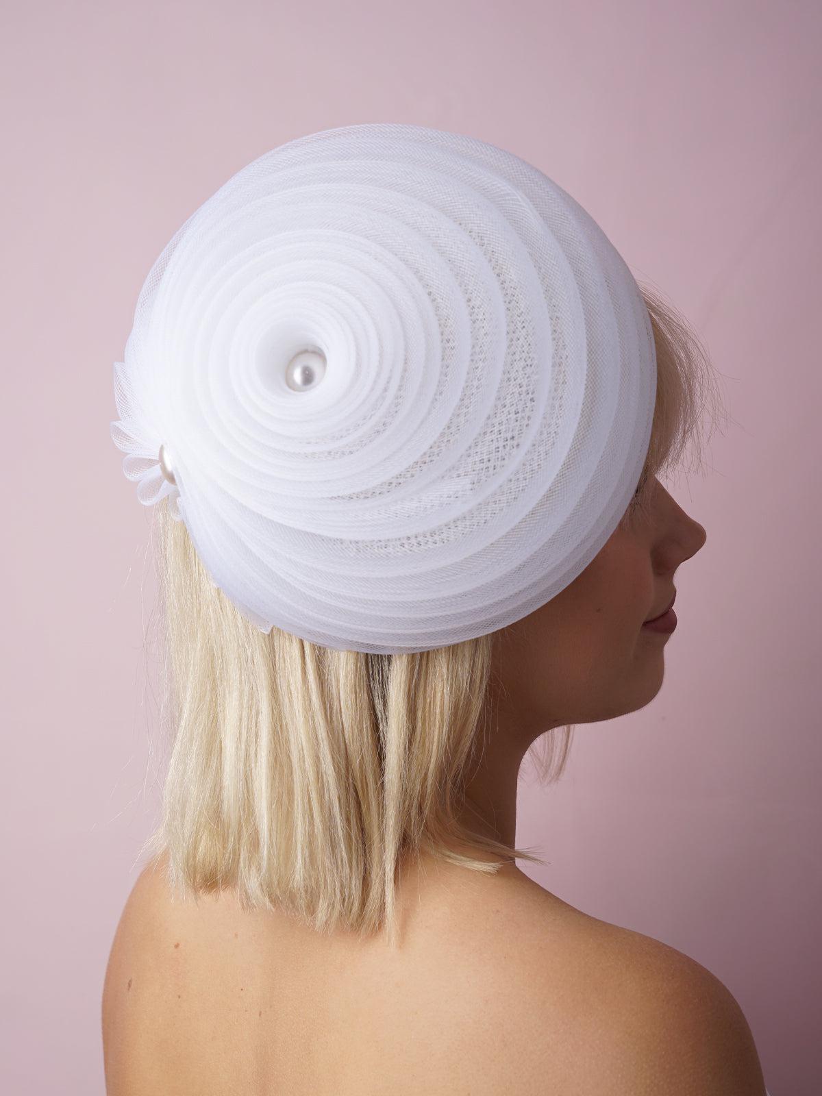 White spiral button hat