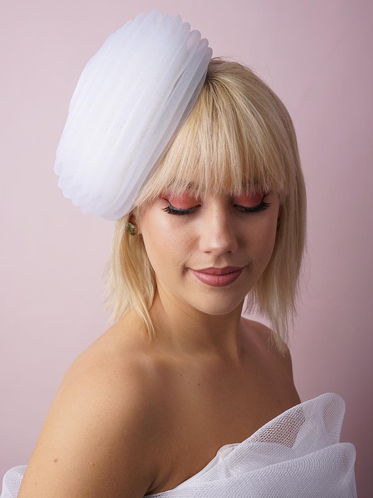 White spiral button hat